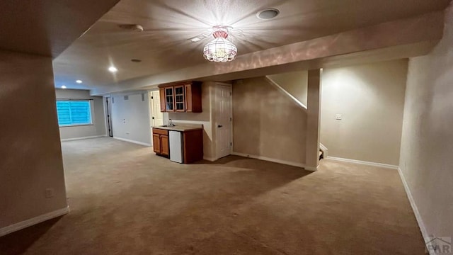 interior space featuring baseboards, recessed lighting, and light colored carpet