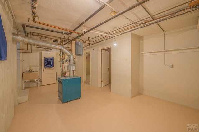 unfinished basement featuring a sink