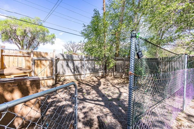 view of yard with a gate and fence