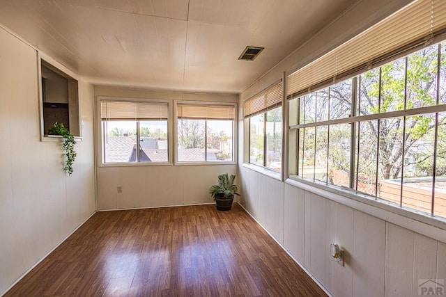 unfurnished sunroom with visible vents