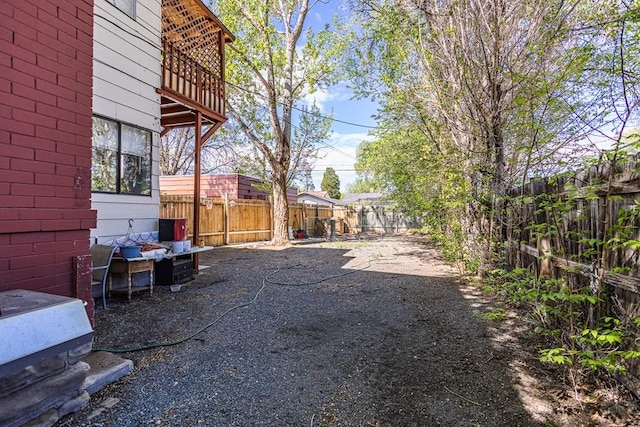 view of yard featuring a patio and a fenced backyard