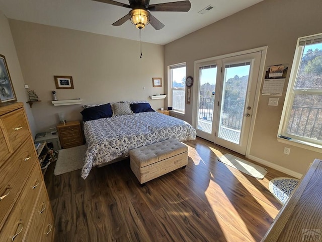 bedroom with dark wood finished floors, access to outside, multiple windows, and visible vents