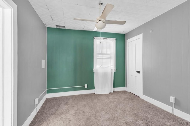 710 Wilson Ave, Pueblo, CO 81004 - carpeted empty room featuring ceiling fan and baseboards