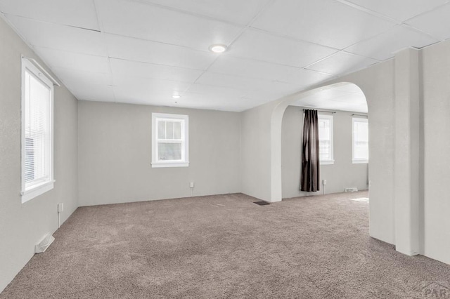 710 Wilson Ave, Pueblo, CO 81004 - carpeted spare room with arched walkways and a paneled ceiling