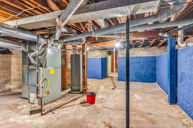 710 Wilson Ave, Pueblo, CO 81004 - unfinished below grade area featuring gas water heater and heating unit