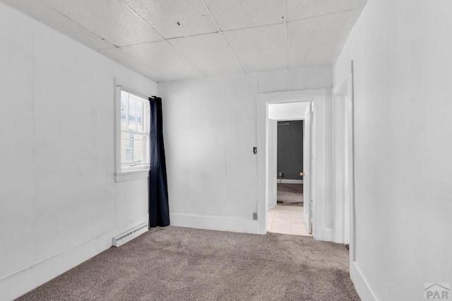 710 Wilson Ave, Pueblo, CO 81004 - empty room featuring carpet and a drop ceiling