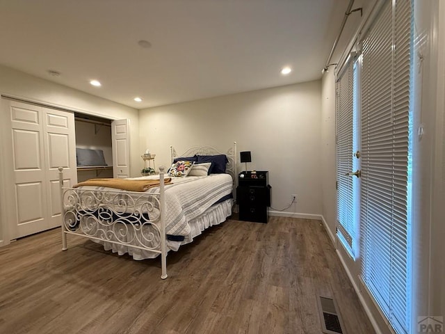1318 Paseo Del Norte, Pueblo, CO 81008 - bedroom with wood finished floors, recessed lighting, a closet, and baseboards