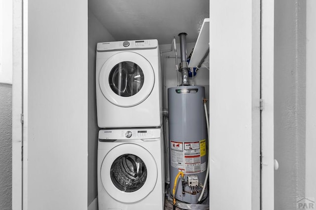 1611 San Juan St Unit B & C, Pueblo, CO 81006 - laundry room with stacked washer and clothes dryer and gas water heater