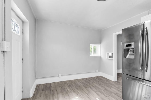 1611 San Juan St Unit B & C, Pueblo, CO 81006 - spare room with baseboards and wood finished floors
