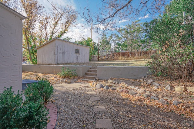 328 Colorado Ave, Walsenburg, CO 81089 - view of yard with an outdoor structure and fence