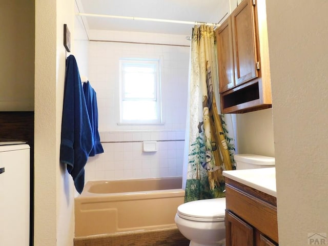 6 Ironweed Dr, Pueblo, CO 81001 - bathroom featuring washer / dryer, a textured wall, toilet, shower / bath combination with curtain, and vanity