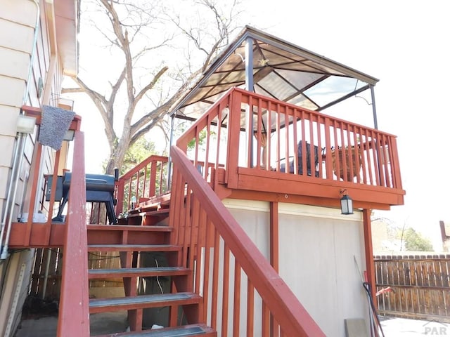 6 Ironweed Dr, Pueblo, CO 81001 - wooden deck featuring stairway and fence