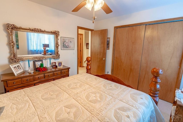 bedroom with a ceiling fan, carpet, and a closet