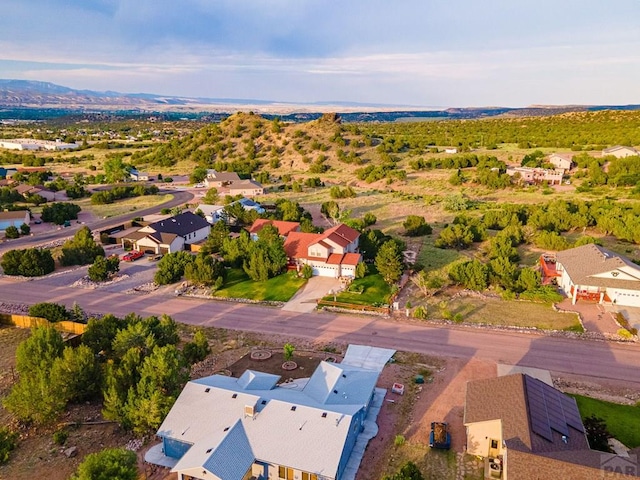 aerial view with a mountain view and a residential view