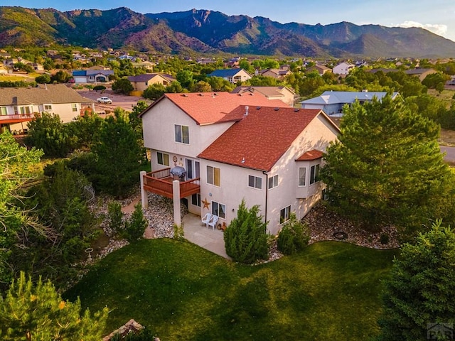 birds eye view of property featuring a residential view and a mountain view