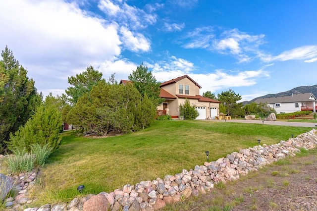 view of front of home featuring a front lawn