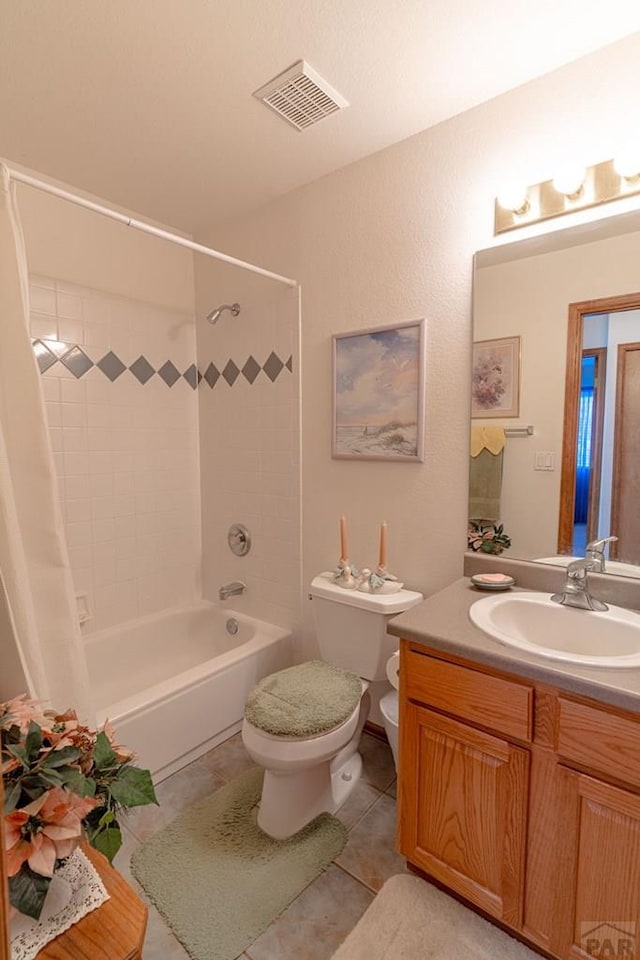 bathroom featuring shower / tub combo, visible vents, toilet, tile patterned floors, and vanity