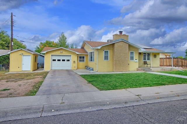 single story home featuring a garage, fence, concrete driveway, a shed, and a chimney