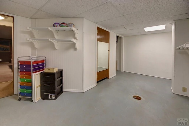 finished basement with a drop ceiling