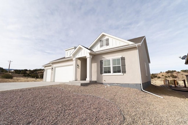 view of front of house with an attached garage and concrete driveway