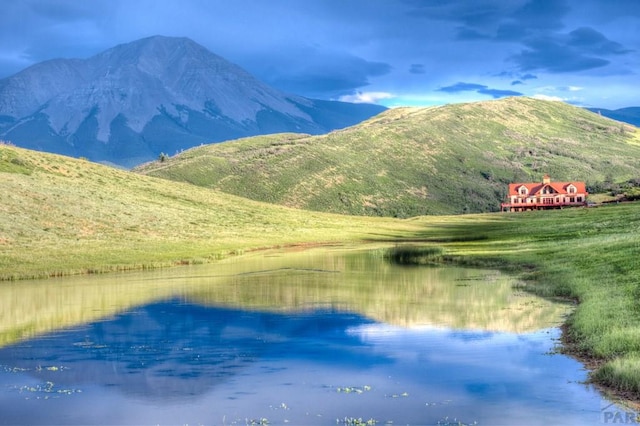 property view of mountains featuring a water view