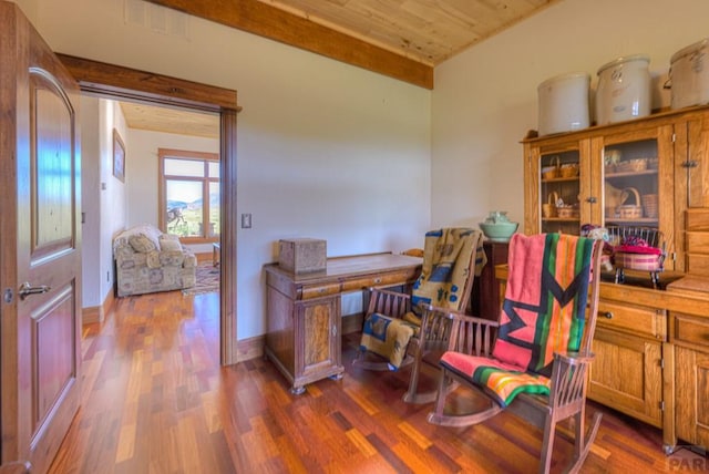 home office with wooden ceiling, dark wood-style floors, visible vents, and baseboards