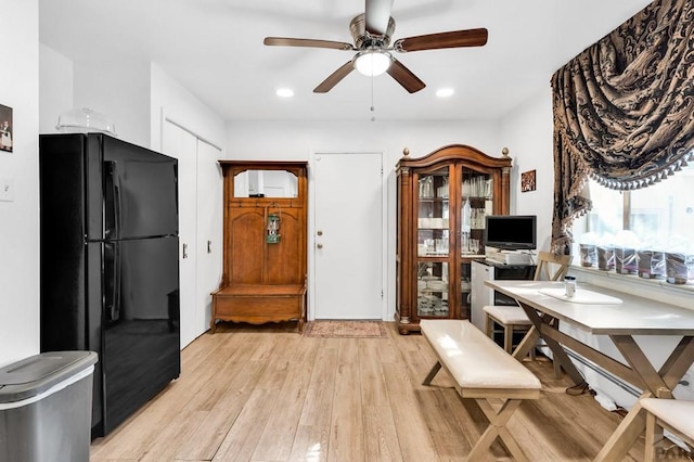 home office featuring recessed lighting, ceiling fan, and light wood-style floors