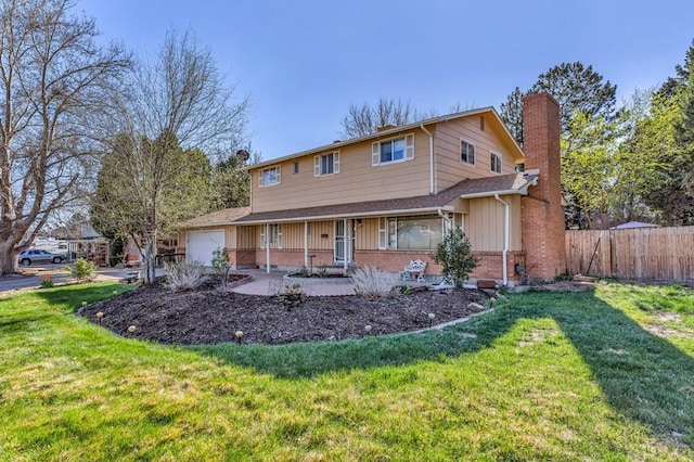 view of front of property featuring a chimney, a porch, fence, a front yard, and an attached garage