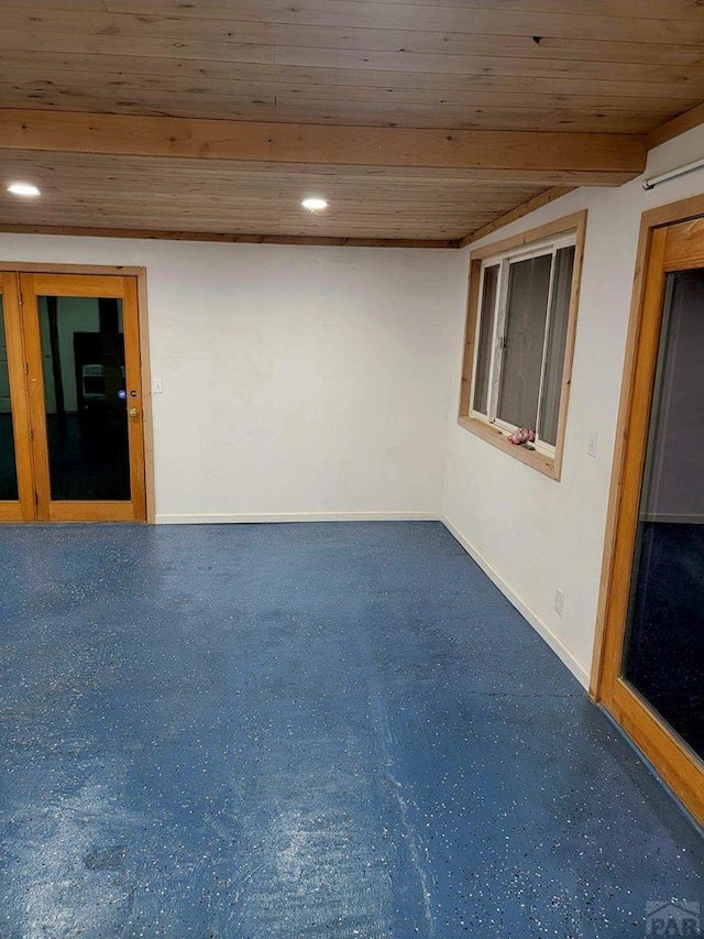 interior space featuring recessed lighting, baseboards, and wood ceiling