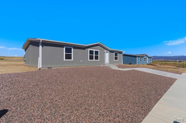 view of front of home with crawl space