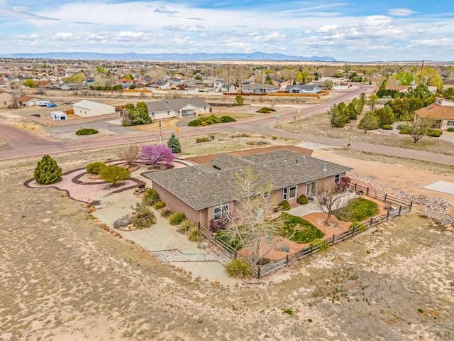 aerial view featuring a residential view and a mountain view