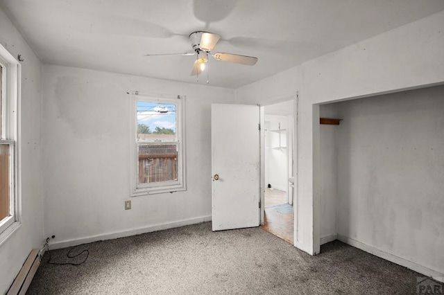 1638 Jackson St, Pueblo, CO 81004 - unfurnished bedroom with a baseboard radiator, carpet floors, ceiling fan, and baseboards