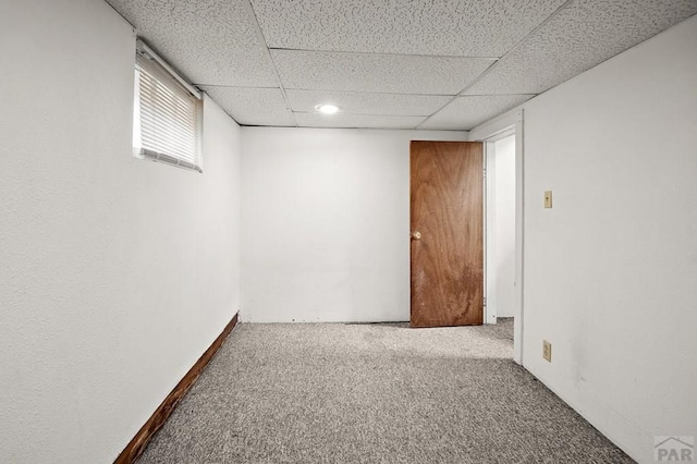 1638 Jackson St, Pueblo, CO 81004 - basement with carpet floors and a drop ceiling