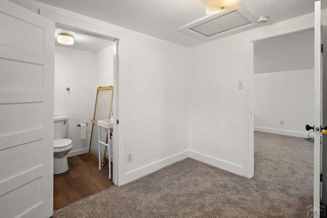 1638 Jackson St, Pueblo, CO 81004 - bathroom with toilet and baseboards