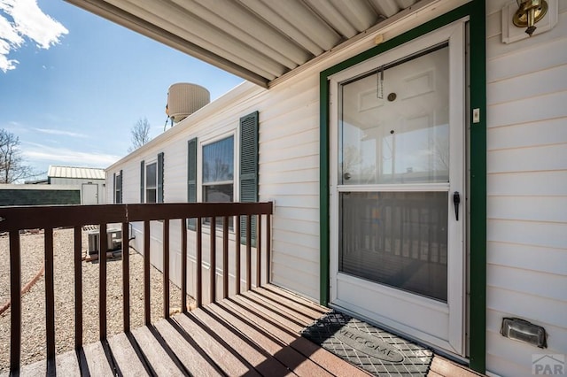 property entrance with a balcony