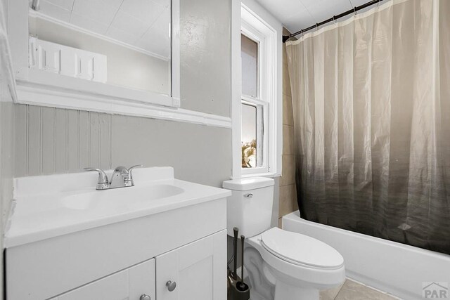 1111 Topaz Pl, Pueblo, CO 81004 - bathroom with shower / bath combo with shower curtain, vanity, and toilet