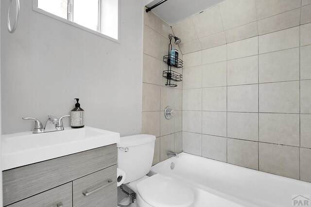 1111 Topaz Pl, Pueblo, CO 81004 - bathroom featuring shower / washtub combination, vanity, and toilet