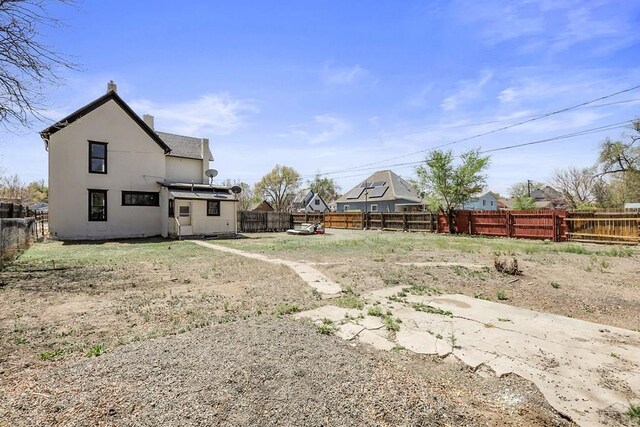 1111 Topaz Pl, Pueblo, CO 81004 - view of yard with a fenced backyard