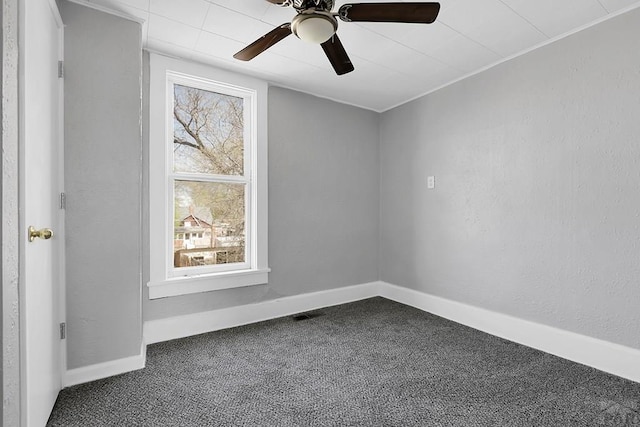 1111 Topaz Pl, Pueblo, CO 81004 - carpeted spare room featuring baseboards and a ceiling fan