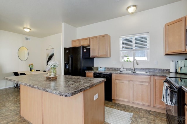 2025 Oneal Cir, Pueblo, CO 81004 - kitchen with black appliances, a sink, light brown cabinets, and dark countertops