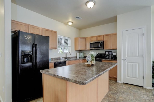 2025 Oneal Cir, Pueblo, CO 81004 - kitchen featuring black appliances, a sink, light brown cabinets, a center island, and dark countertops