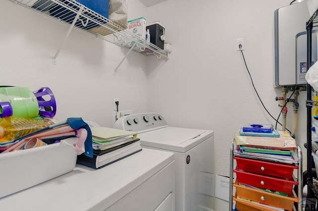 2025 Oneal Cir, Pueblo, CO 81004 - laundry room featuring washer and dryer and tankless water heater