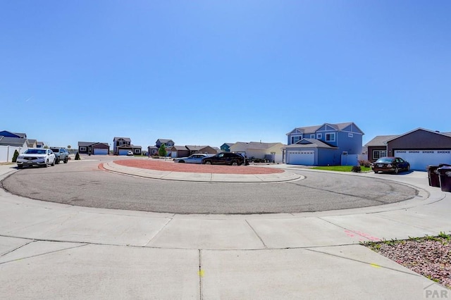 2025 Oneal Cir, Pueblo, CO 81004 - view of road featuring a residential view and sidewalks