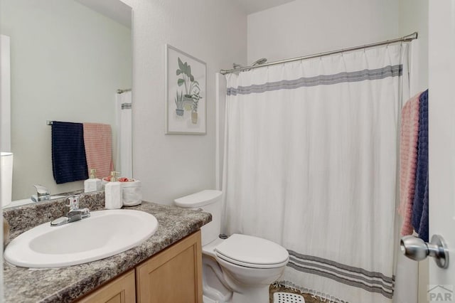2025 Oneal Cir, Pueblo, CO 81004 - full bath with vanity, toilet, and curtained shower