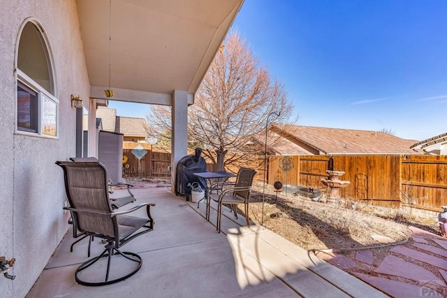 view of patio / terrace featuring area for grilling and a fenced backyard