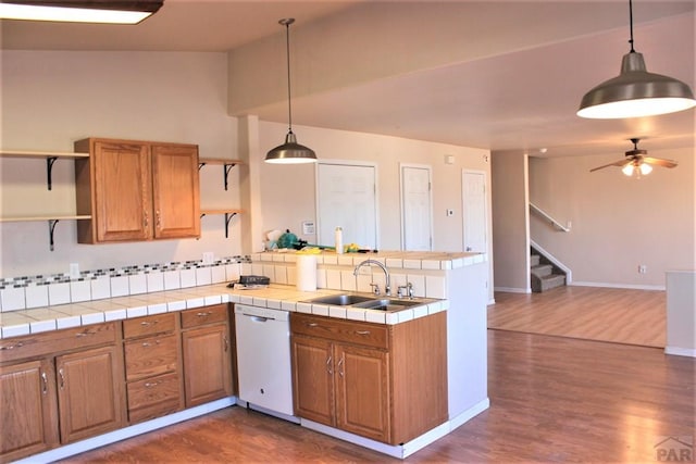 628 S Blakeland Ct, Pueblo West, CO 81007 - kitchen with dishwasher, a peninsula, open shelves, a sink, and ceiling fan