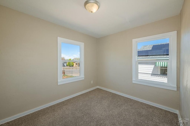 1902 E 12th St, Pueblo, CO 81001 - unfurnished room with carpet and baseboards
