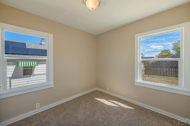 1902 E 12th St, Pueblo, CO 81001 - unfurnished room featuring carpet and baseboards