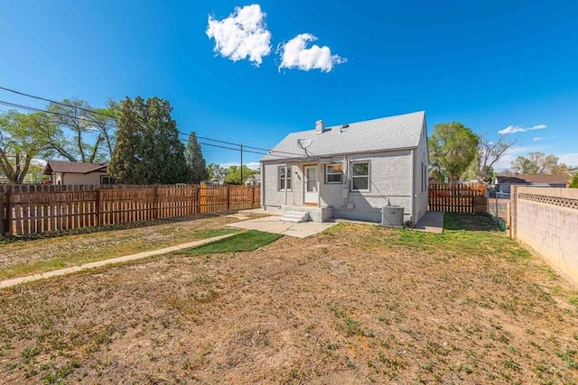 1902 E 12th St, Pueblo, CO 81001 - rear view of property featuring central AC