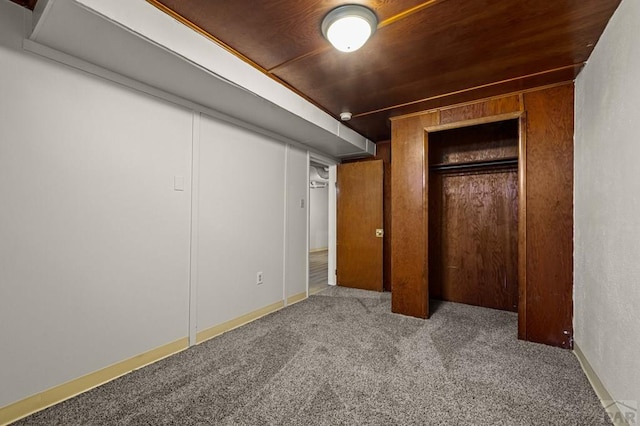 unfurnished bedroom featuring a closet and carpet flooring